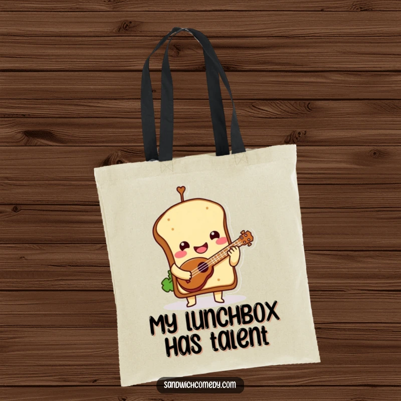 Funny Tote Bag with a smiling sandwich character, top bun tilted, playing a delightful tiny ukulele.